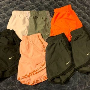 Lot of 7 pairs of Nike running shorts. Excellent new condition. 70$ takes all.
